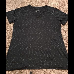 Reebok Vneck sport shirt.  It’s new without tags